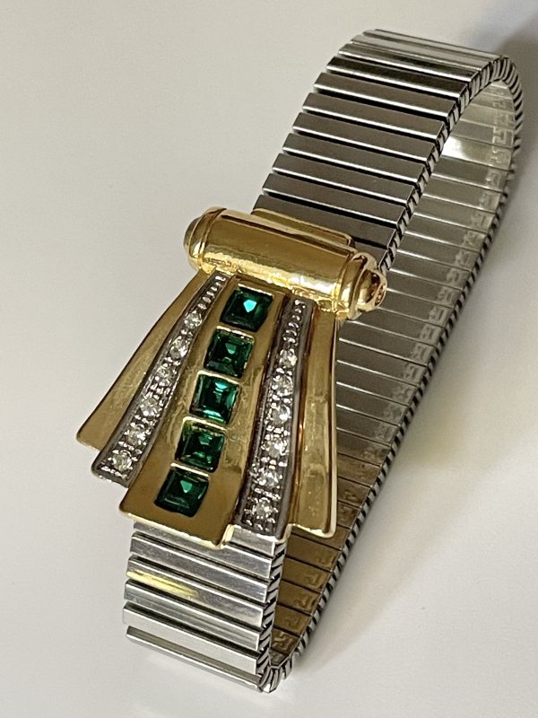 Bracciale in acciaio elastico rodio e oro con strass verdi